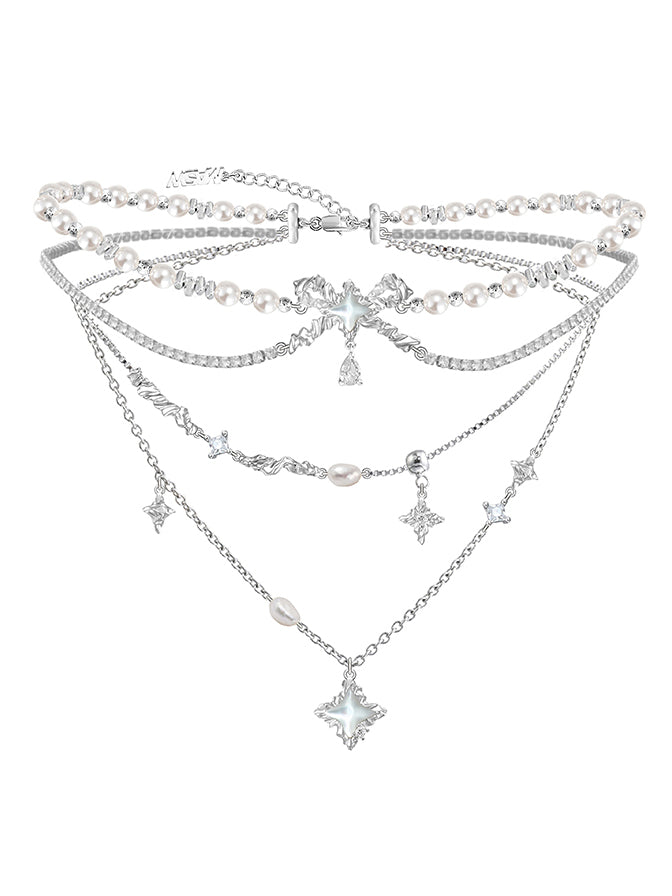 Layered pearl necklace with star pendant