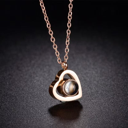 Collar de corazón con proyección de fotos