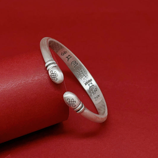 Ethnic floral relief sterling silver bracelet