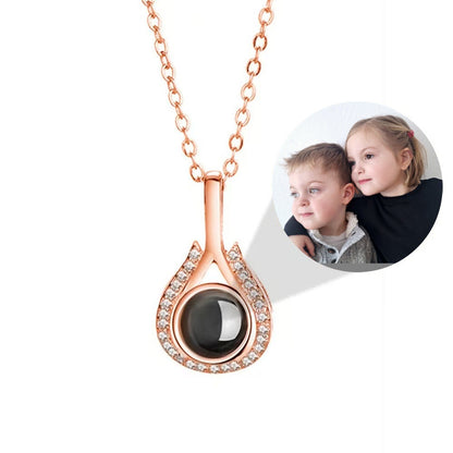 Collar de lágrima en forma de corazón con proyección de fotos