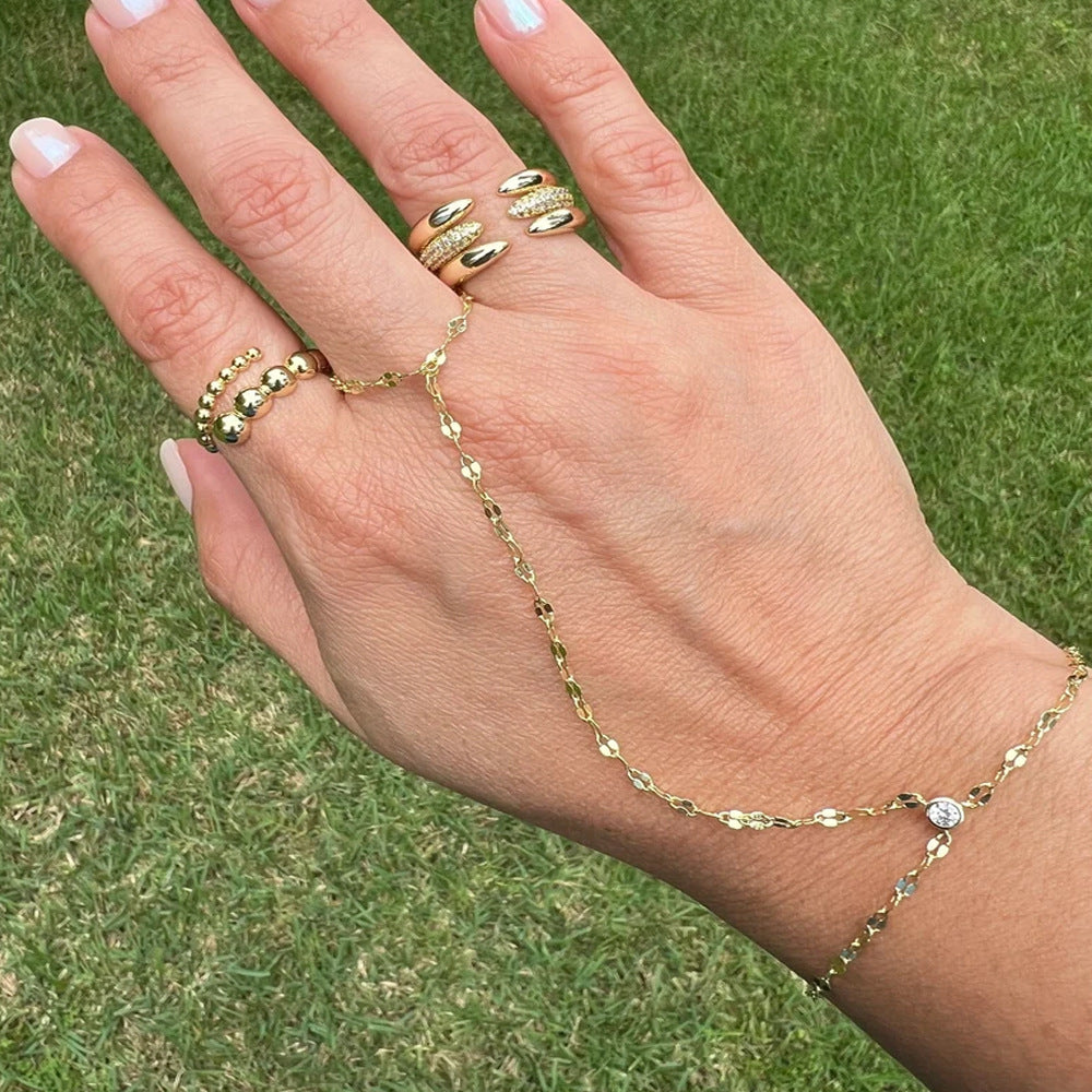 Delicate gold ring finger chain