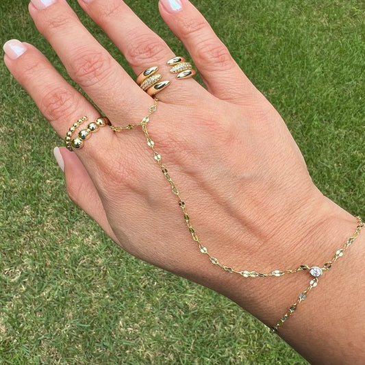 Delicate gold ring finger chain