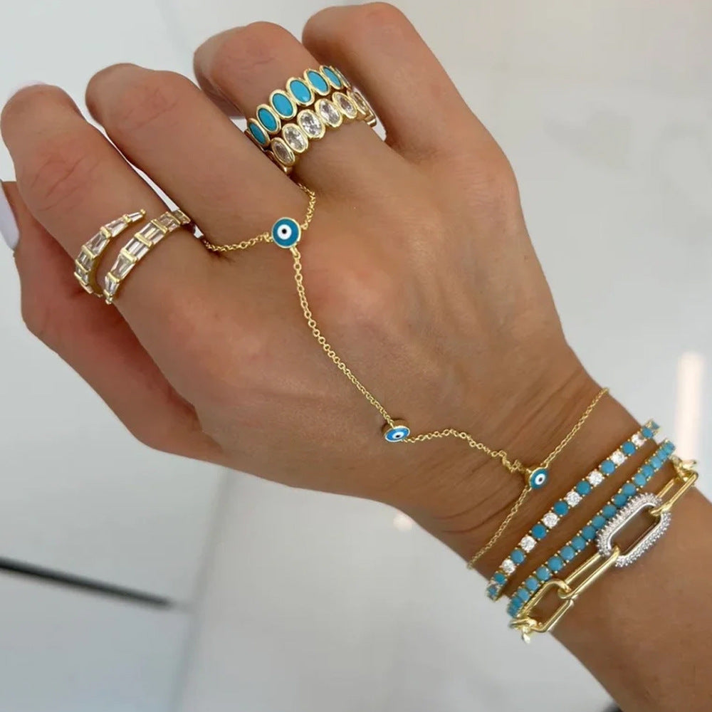 Delicate gold ring finger chain