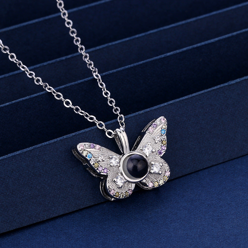 Photo projection colored diamond butterfly necklace