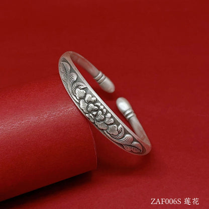 Ethnic floral relief sterling silver bracelet