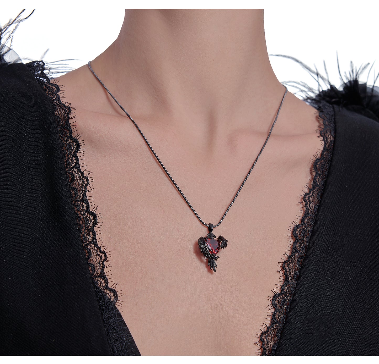 Black crow heart necklace