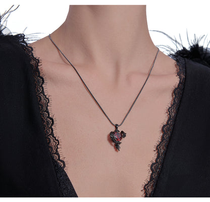 Black crow heart necklace