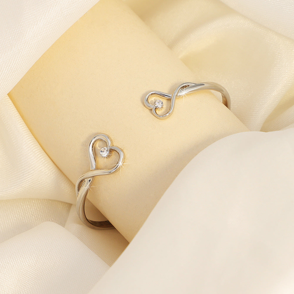 Corrosion engraved heart shape bracelet