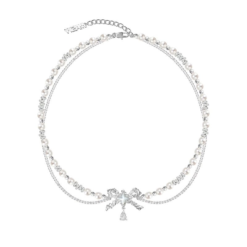 Layered pearl necklace with star pendant