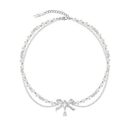 Layered pearl necklace with star pendant