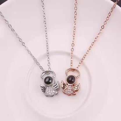 Collar de alas de ángel con proyección de fotos