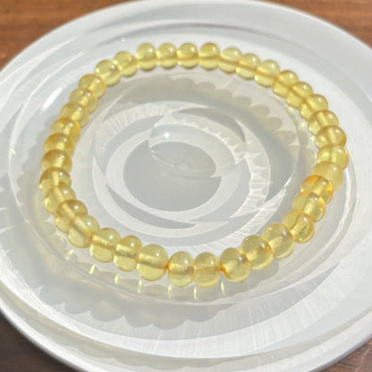 A golden amber apple - shaped beaded bracelet - jewelry - weilin.com