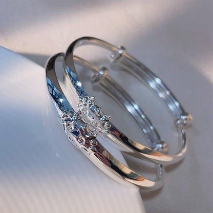 A pair of smooth dragon push - pull bracelets for children - jewelry - weilin.com
