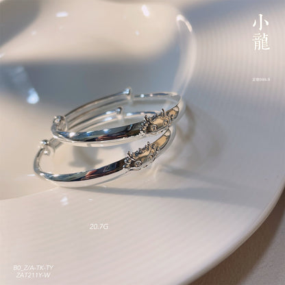A pair of smooth dragon push - pull bracelets for children - jewelry - weilin.com