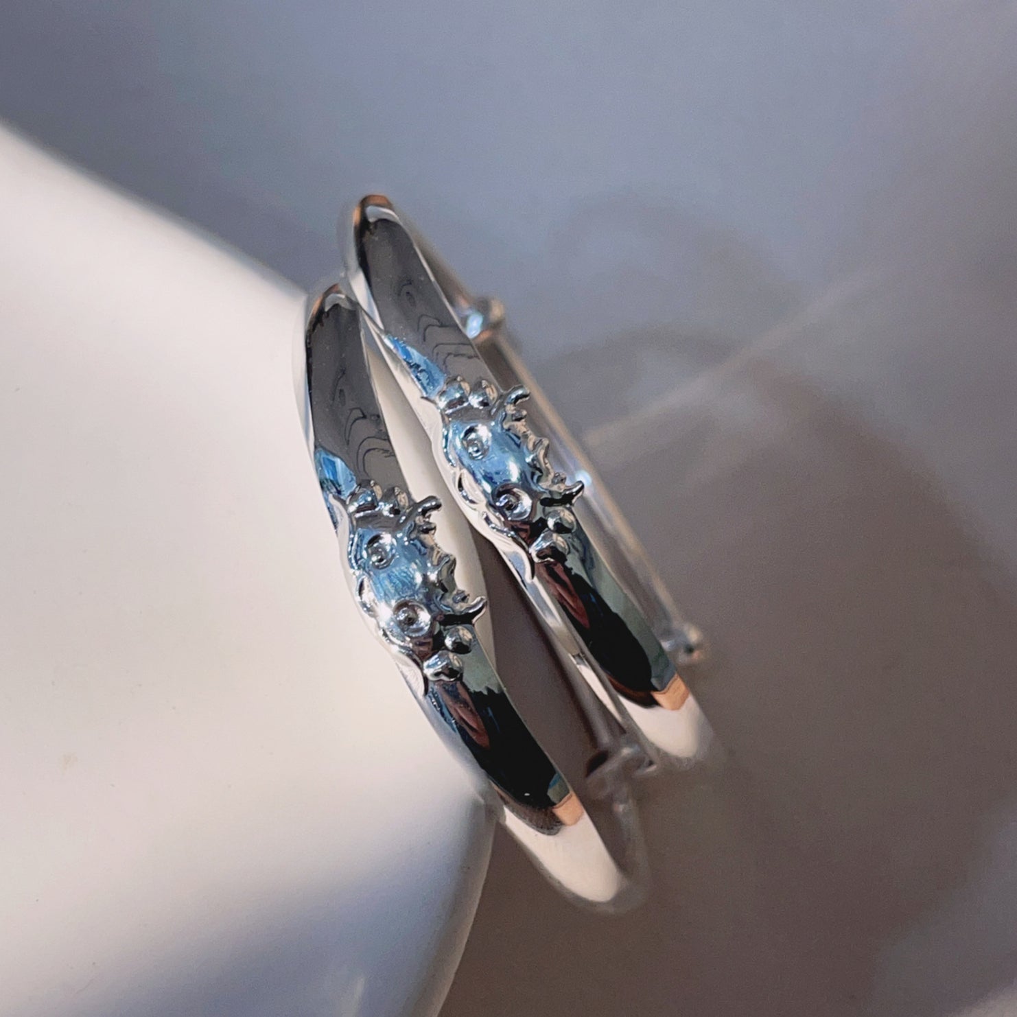 A pair of smooth dragon push - pull bracelets for children - jewelry - weilin.com