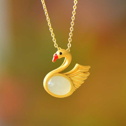 Detailed view of traditional swan motif on ancient-style silver jewelry