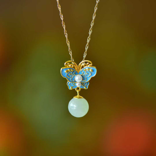 Close-up view of premium Hetian jade butterfly pendant with delicate wings in S925 silver