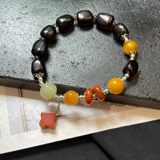 Blood amber beeswax bracelet - jewelry - weilin.com