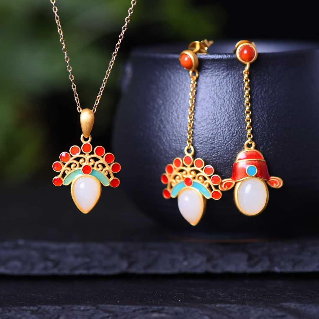 Close-up view of premium Hetian jade gourd and magpie pendant with thick matte gold plating