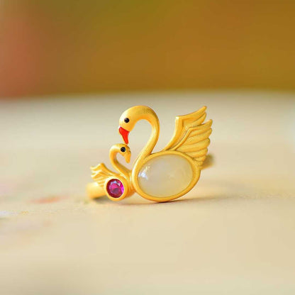 Close-up of elegant swan design pendant in vintage silver setting