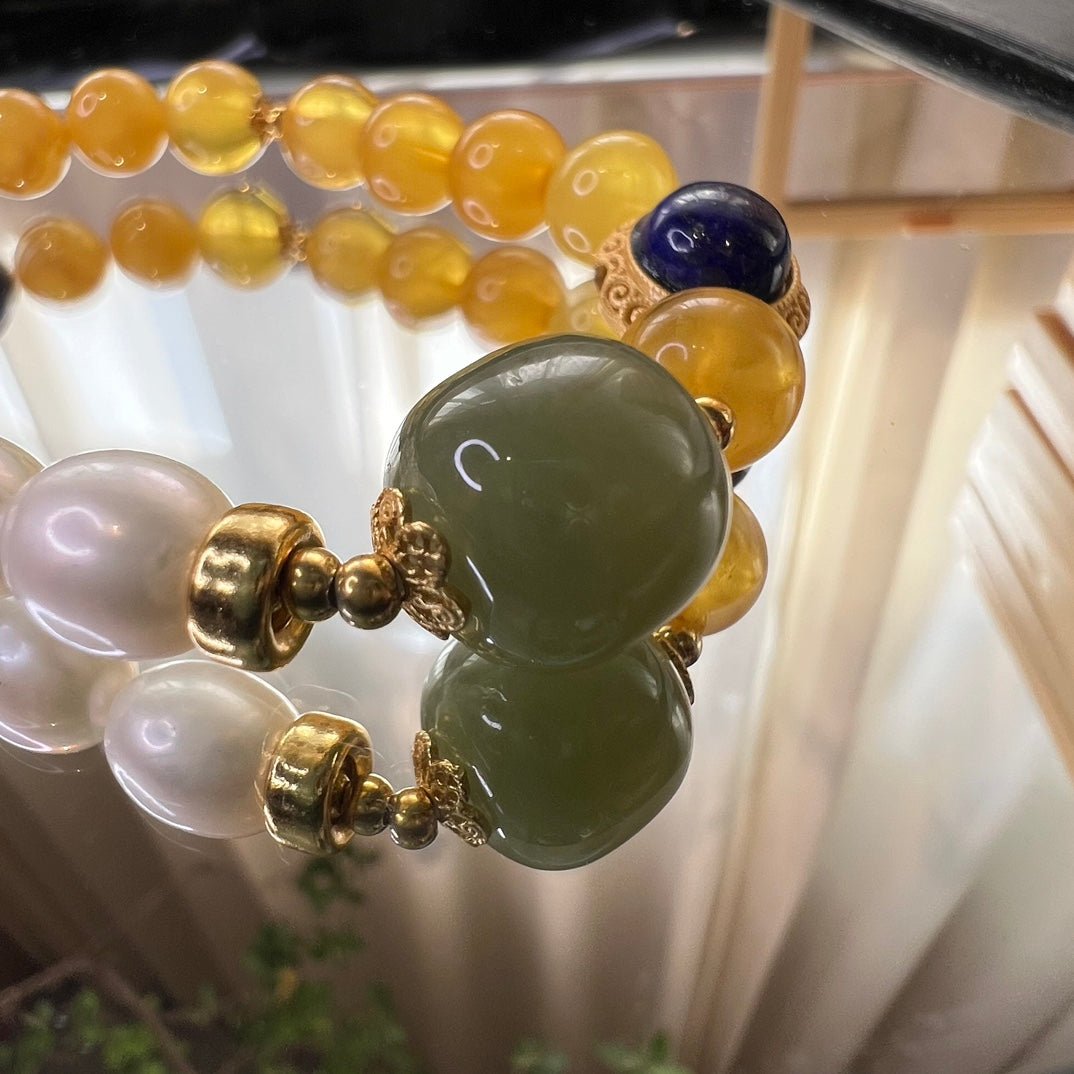 Chinese mandarin duck pearl beeswax bracelet - jewelry - weilin.com