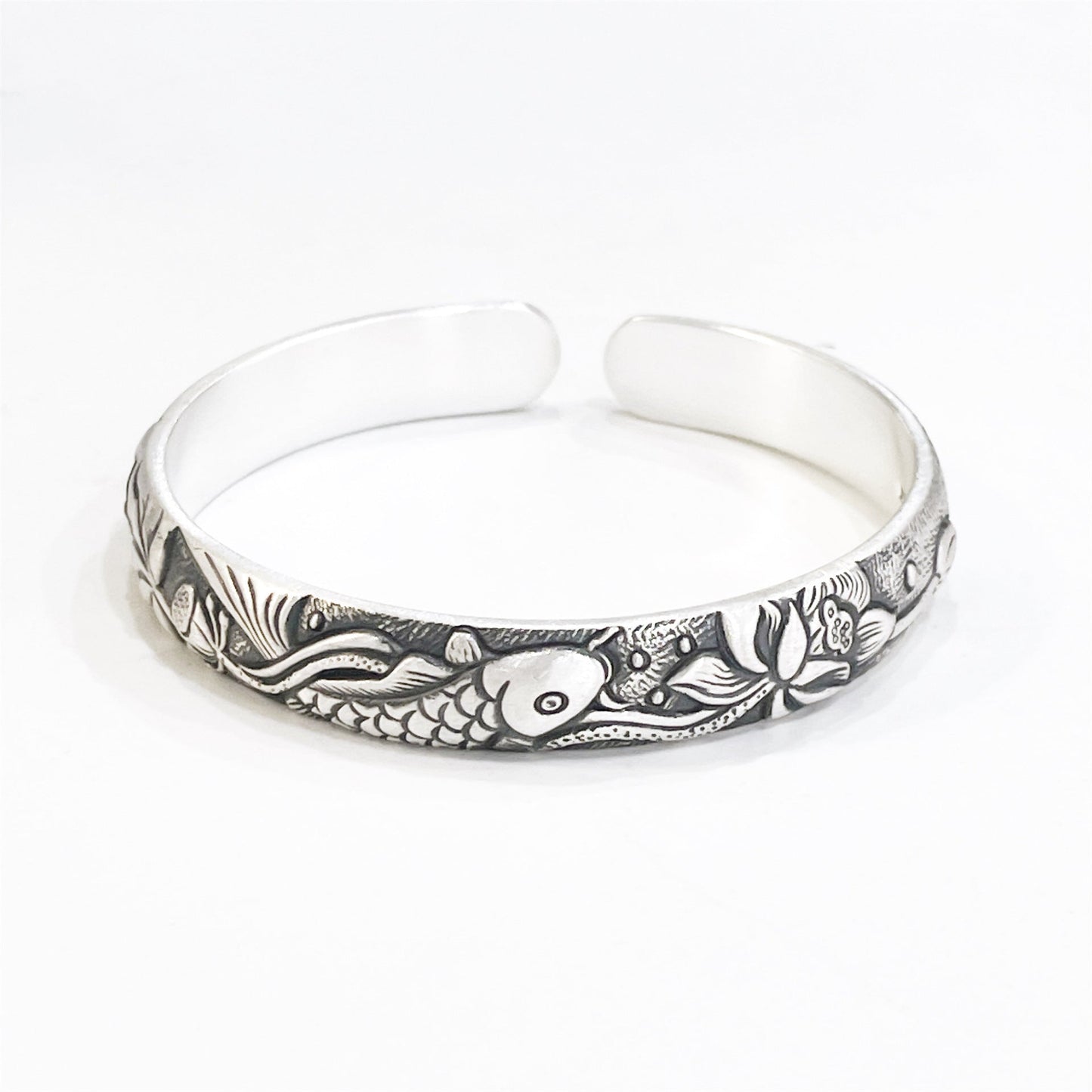 Chinese style embossed sterling silver bracelet - jewelry - weilin.com