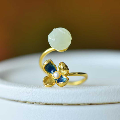 Elegant ancient-style silver inlaid Hetian jade set featuring lotus and prosperity symbols