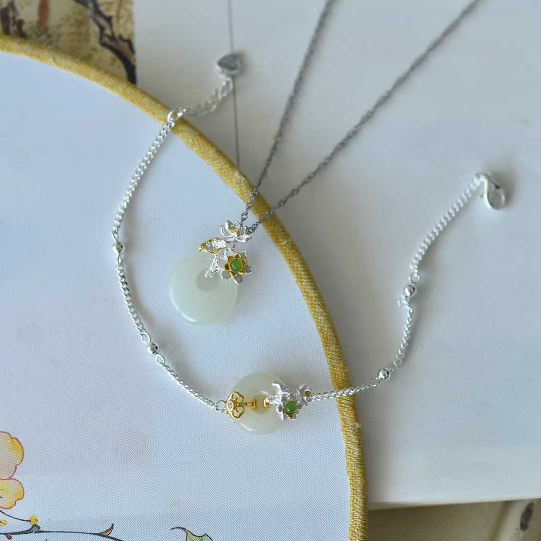 Elegant 925 silver inlaid Hetian jade set featuring June Flower God lotus design