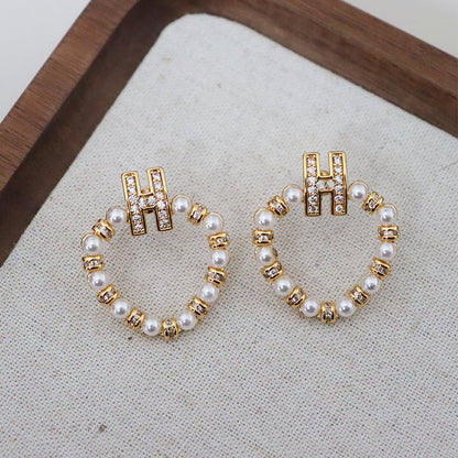 Design personality letter zircon exquisite earrings - jewelry - weilin.com