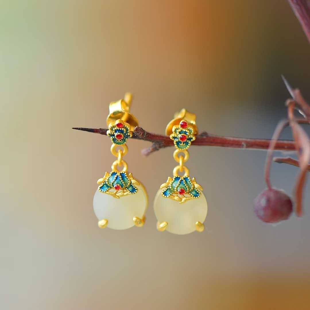 Detailed view of traditional orchid motif on ancient-style Hetian nephrite jewelry