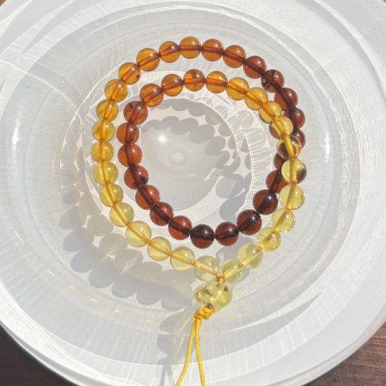 Rainbow amber beaded pendant