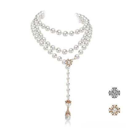 Long pearl necklace with multiple layers