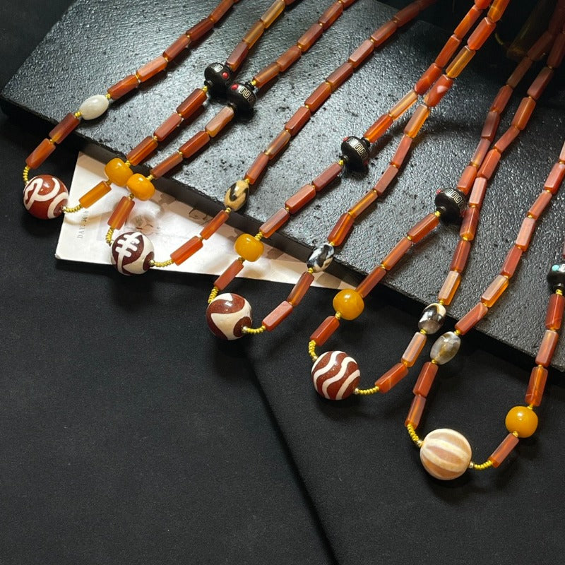 قلادة الترقوة من خرز دزي العصري من العقيق