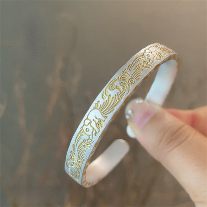 Solid bracelet with gold - painted lucky elephant and hammered pattern - jewelry - weilin.com