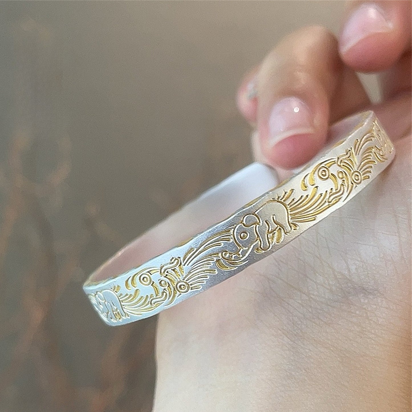 Solid bracelet with gold - painted lucky elephant and hammered pattern - jewelry - weilin.com