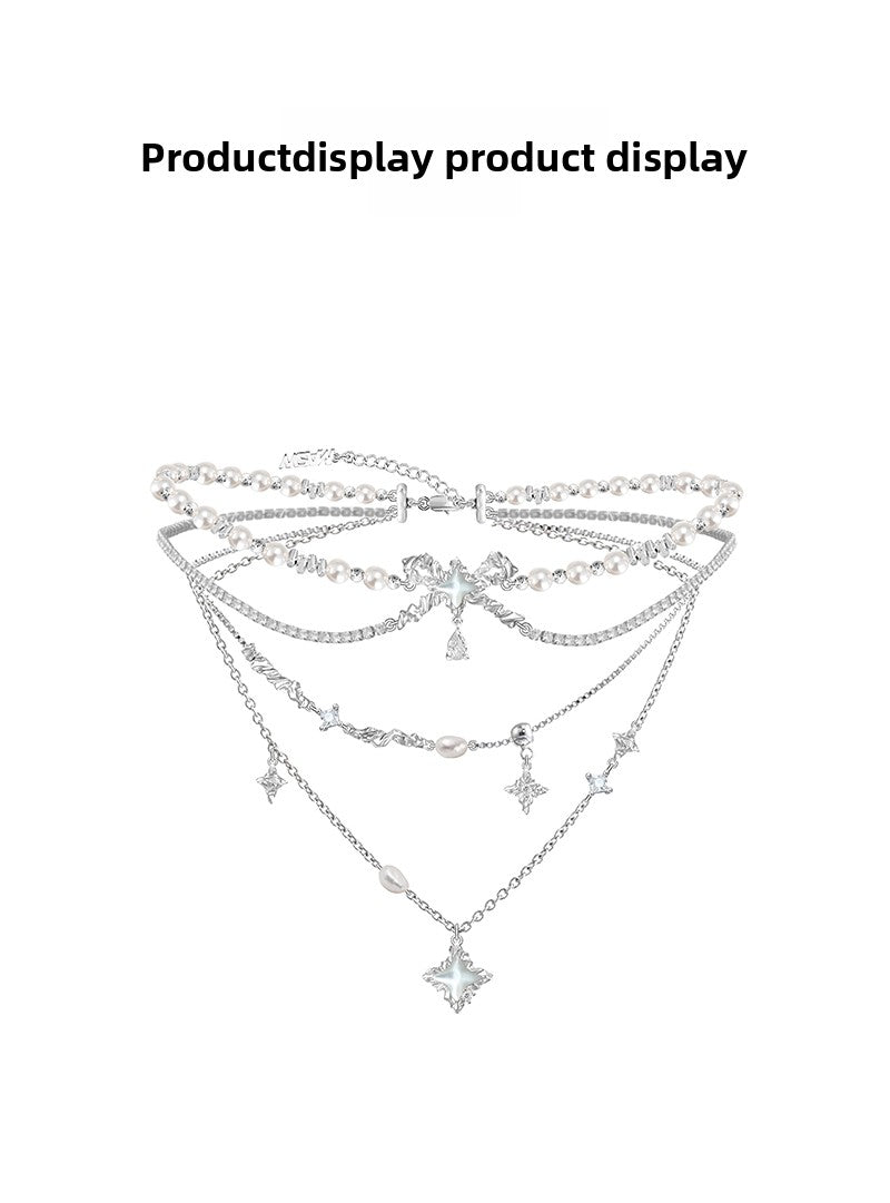 Layered pearl necklace with star pendant